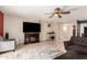 Spacious living room featuring tile floors, a ceiling fan, and neutral paint at 3345 E University Dr # 29, Mesa, AZ 85213