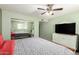 Comfortable main bedroom features large closet and an entertainment center at 3345 E University Dr # 29, Mesa, AZ 85213