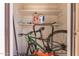 Storage closet with shelves to organize and hold a wide variety of items with room for a bicycle at 3345 E University Dr # 29, Mesa, AZ 85213