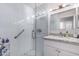 Bright bathroom with glass-enclosed shower, white subway tile, and granite vanity at 4113 N 10Th Pl, Phoenix, AZ 85014