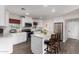Bright and updated kitchen with white cabinetry, granite countertops, and stainless steel appliances at 4113 N 10Th Pl, Phoenix, AZ 85014