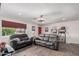 Comfortable living room featuring neutral paint, modern lighting, and wood flooring at 4113 N 10Th Pl, Phoenix, AZ 85014
