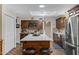 Well-equipped kitchen features an island, stainless steel appliances, and plenty of cabinet space at 4432 E Carmel Ave, Mesa, AZ 85206