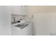 A bright laundry room with modern appliances and storage at 4432 E Carmel Ave, Mesa, AZ 85206