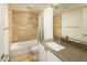 Bathroom featuring a vanity, toilet, tub, shower with a neutral color scheme, and light wood look tile at 4507 N 12Th St # 6, Phoenix, AZ 85014