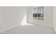 Light-filled bedroom with a large window showcasing the exterior view at 4946 W Weeping Willow Way, Laveen, AZ 85339