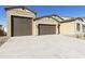 Attractive single-Gathering home with a spacious three-car garage and neutral-toned exterior at 4946 W Weeping Willow Way, Laveen, AZ 85339