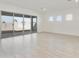 Bright and airy living area with large sliding doors and ample natural light at 4946 W Weeping Willow Way, Laveen, AZ 85339