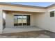 Back patio with sliding glass doors leading to the interior, perfect for relaxation at 4946 W Weeping Willow Way, Laveen, AZ 85339