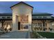 Community center with a covered walkway, outdoor seating and well manicured lawns at 5748 E Sierra Morena St, Mesa, AZ 85215