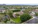 Aerial view of backyard oasis, landscaped lawn and pool. Great curb appeal at 5801 E Exeter Blvd, Phoenix, AZ 85018
