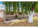 Cozy single-story home with a decorative front garden, mature landscaping, and inviting curb appeal at 6235 N 25Th Ave, Phoenix, AZ 85015