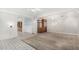 Spacious living room with open layout, ceiling fans, and carpet flooring at 6235 N 25Th Ave, Phoenix, AZ 85015