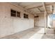Covered outdoor patio with concrete floor and white painted walls provides perfect retreat at 6235 N 25Th Ave, Phoenix, AZ 85015