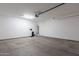 Spacious two car garage, perfect for storing vehicles, or creating a workshop at 6853 E Posada Cir, Mesa, AZ 85212