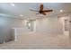 Cozy loft with neutral carpet, ceiling fan, recessed lighting, and easy access to various rooms at 6853 E Posada Cir, Mesa, AZ 85212