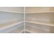 A well-organized and bright, walk-in pantry with ample shelving for optimal storage at 6853 E Posada Cir, Mesa, AZ 85212