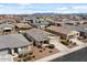 Residential neighborhood displaying single-Gathering homes with mountain views in the distance at 730 W Wind Cave Dr, San Tan Valley, AZ 85140