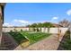 Spacious backyard with ample green space, and mature landscaping at 730 W Wind Cave Dr, San Tan Valley, AZ 85140
