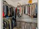 Spacious walk-in closet with ample shelving and hanging space for organized storage at 730 W Wind Cave Dr, San Tan Valley, AZ 85140