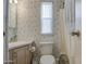 Bathroom features a clean, coordinated design and a bright window with nice natural light at 7750 E Broadway Rd # 294, Mesa, AZ 85208