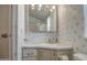 Bathroom features a clean, coordinated design and a bright mirror and light at 7750 E Broadway Rd # 294, Mesa, AZ 85208