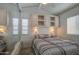 Bedroom featuring coordinated cabinets above a bed with natural lighting from the window at 7750 E Broadway Rd # 294, Mesa, AZ 85208
