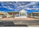 Manufactured home with carport and front patio in well maintained community at 7750 E Broadway Rd # 294, Mesa, AZ 85208