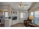 Living room with ceiling fan and natural light at 7750 E Broadway Rd # 294, Mesa, AZ 85208