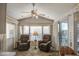 Inviting living room featuring comfortable seating, a ceiling fan, and natural light from a sliding door at 7750 E Broadway Rd # 294, Mesa, AZ 85208