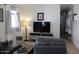 Comfortable living room with neutral tones, plush seating, and ample natural light at 7807 E Main St # D-6, Mesa, AZ 85207