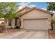 Charming single-story home with a two-car garage and low maintenance front yard at 8325 N 61St Ln, Glendale, AZ 85302