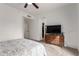 Comfortable bedroom features neutral tones, a ceiling fan, and a view of the closet at 8325 N 61St Ln, Glendale, AZ 85302