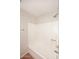 Bathtub with white tile surround and shower head at 8625 E Belleview Pl # 1012, Scottsdale, AZ 85257