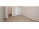 Bedroom with neutral walls, carpet flooring, and closet at 8625 E Belleview Pl # 1012, Scottsdale, AZ 85257
