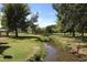 Peaceful creek flowing through a lush park setting, creating a tranquil atmosphere at 8625 E Belleview Pl # 1012, Scottsdale, AZ 85257