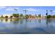 Picturesque lake with lush green surroundings, perfect for relaxing walks and outdoor activities at 8625 E Belleview Pl # 1012, Scottsdale, AZ 85257