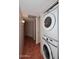 Laundry room featuring stacked washer and dryer units and tile flooring at 8625 E Belleview Pl # 1012, Scottsdale, AZ 85257