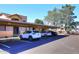 Designated parking area with covered spots for residents and guests at 8625 E Belleview Pl # 1012, Scottsdale, AZ 85257