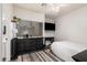 Cozy bedroom featuring a large window, media center, and neutral tones, ideal for relaxation at 9758 E Monterey Ave, Mesa, AZ 85209