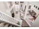 Grand foyer with high ceilings, and elegant staircase leads to a spacious, sunlit living area at 9758 E Monterey Ave, Mesa, AZ 85209