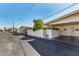 A covered parking area sits next to this townhome, with a desert-friendly landscape at 10547 W Coggins Dr, Sun City, AZ 85351
