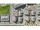 An aerial view shows the rooftops of houses in a well-planned community, with sidewalks and manicured green spaces at 1255 N Arizona Ave # 1043, Chandler, AZ 85225