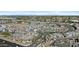 Expansive aerial view highlighting the community's layout, including roads, homes, and nearby amenities in the area at 1255 N Arizona Ave # 1043, Chandler, AZ 85225