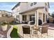 Charming backyard features a paved patio area, seating, and lush green landscaping, perfect for relaxation at 1255 N Arizona Ave # 1043, Chandler, AZ 85225