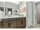 Bathroom with a double vanity and stylish decor provides a functional and elegant space at 1255 N Arizona Ave # 1043, Chandler, AZ 85225