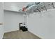 Spacious walk-in closet with shelving, carpet flooring, and ample storage space for organizing clothes at 1255 N Arizona Ave # 1043, Chandler, AZ 85225