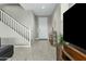 Inviting entryway with tiled flooring, staircase, and a view of the front door sets a welcoming tone at 1255 N Arizona Ave # 1043, Chandler, AZ 85225