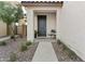Welcoming front porch with a cozy seating area and manicured landscaping enhances the curb appeal at 1255 N Arizona Ave # 1043, Chandler, AZ 85225