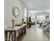 Inviting living room with console table and view of patio with ample natural light at 1255 N Arizona Ave # 1043, Chandler, AZ 85225